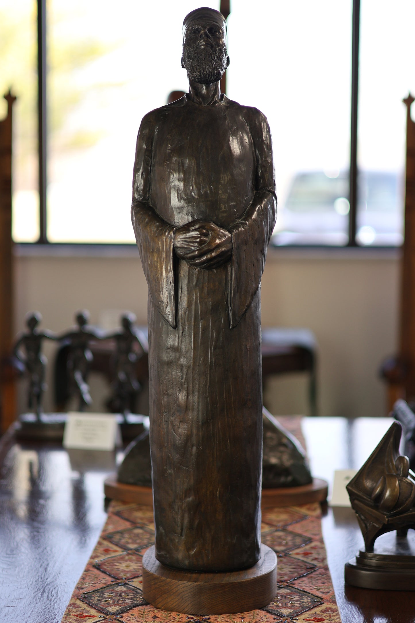 Sculpture of Man Singing by John Leon